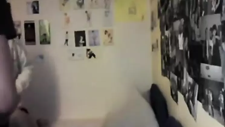 In the bedrom with her brother and cousin