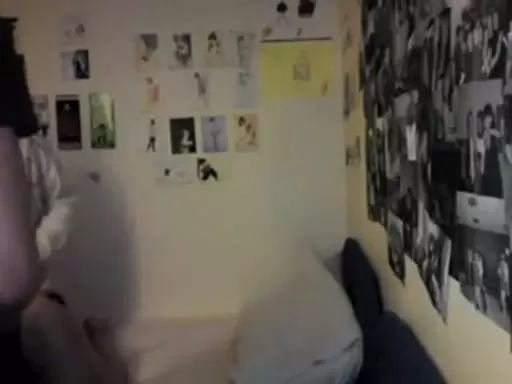 In the bedrom with her brother and cousin