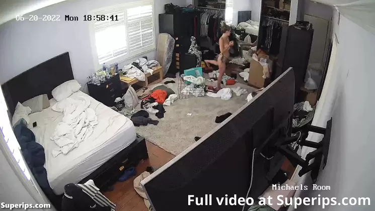 IPCAM – Blonde cheerleader girl puts on a bik