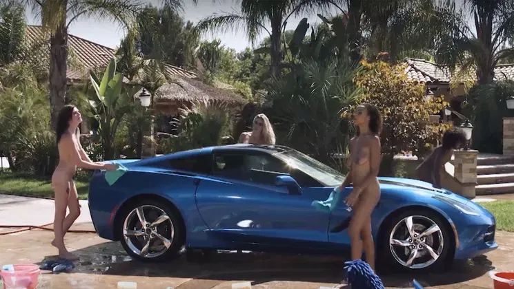 Hot babes washed blue Corvette Stingray