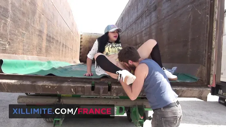 French hottie with natural tits takes a hard pounding in the trailer of a truck
