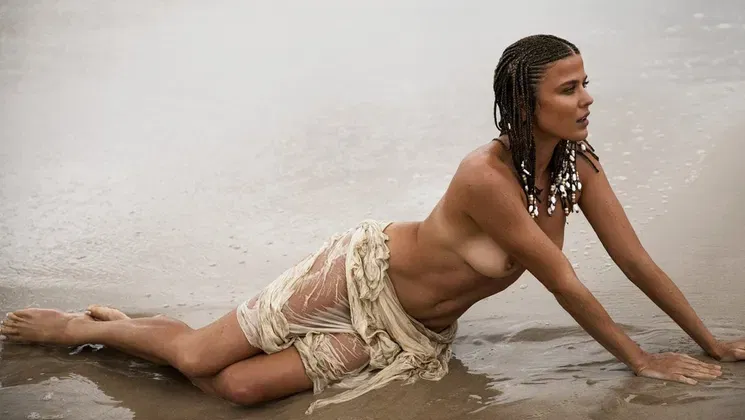 Petite Australian MILF strips at a beach