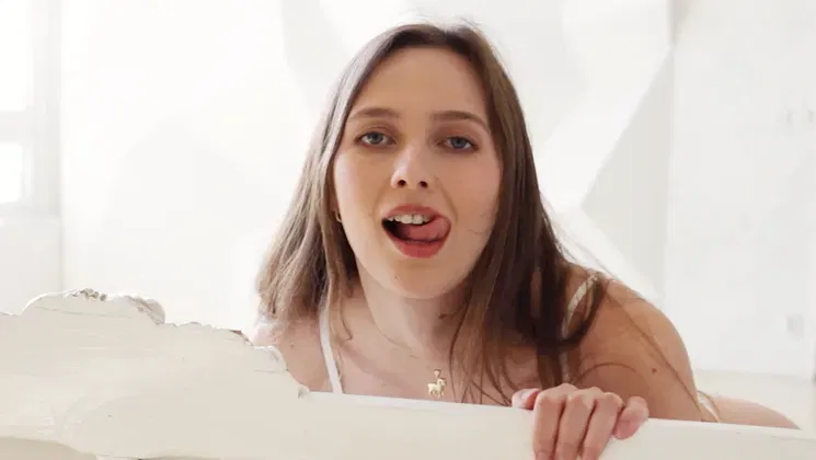 Stunning brunette babe all in white