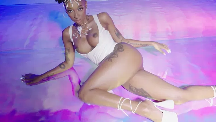 Big tits ebony teen model exposing booty